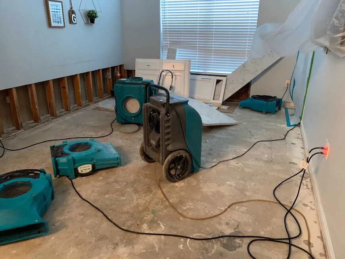 Dehumidifier in flood-cut room for Water Damage Restoration in Douglass